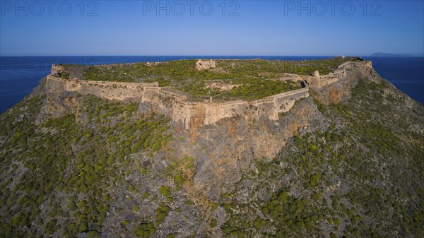 Drone shot, Historic fortress on rocky cliffs under a clear sky, Venetian sea fortress, Gramvoussa, Gramvoussa peninsula, Pirate Bay, Balos, Lagoon, Northwest Crete, Crete, Greek Islands, Greece, Europe