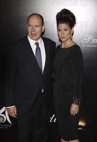 Prince Albert II of Monaco and Debra Messing at the Rodeo Drive Walk of Style Award honoring Princess Grace Kelly of Monaco and Cartier held in Beverly Hills, USA on October 22, 2009