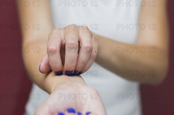 Great concept of allergy and skin diseases, young woman scratching herself