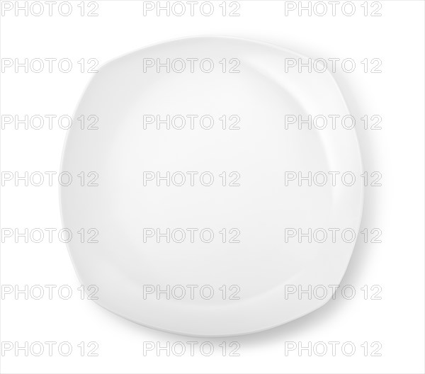 Figured white plate isolated on a white background