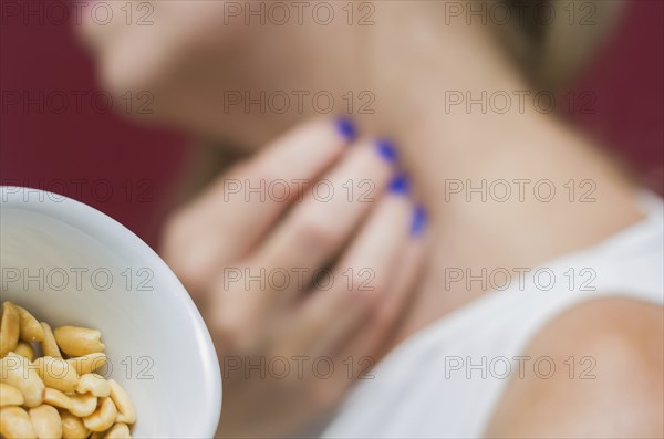 Great concept of allergy and skin diseases, young woman scratching herself