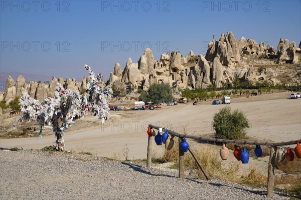 Ceramic pottery and rock formations of mountain ridges, valleys and pinnacles at Göreme National Park, Cappadocia, Turkey, Asia