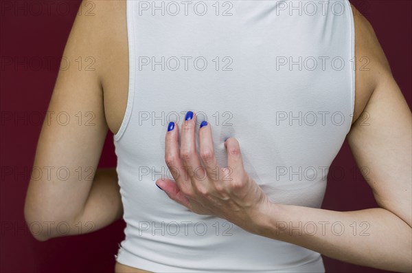 Great concept of allergy and skin diseases, young woman scratching herself