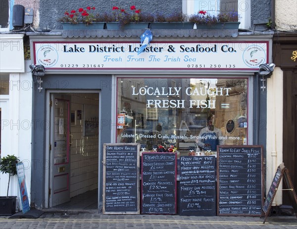 Ulverston, cumbria, united kingdom, 16 september 2021: retail display in the window of the lake district lobster and seafood fishmongers in ulverston cumbria