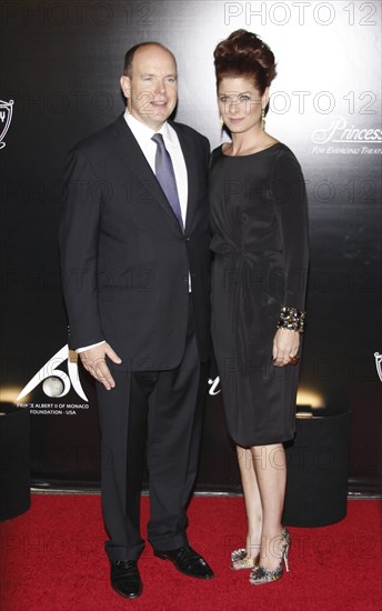 Prince Albert II of Monaco and Debra Messing at the Rodeo Drive Walk of Style Award honoring Princess Grace Kelly of Monaco and Cartier held in Beverly Hills, USA on October 22, 2009