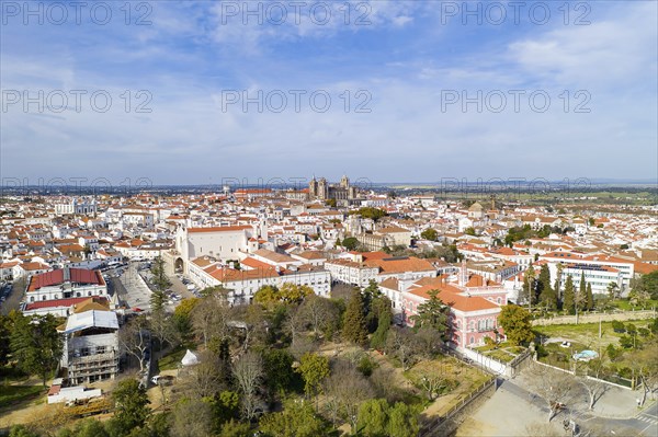 Evora drone aerial view on a sunny day with historic buildings city center and church in Alentejo, Portugal, Europe