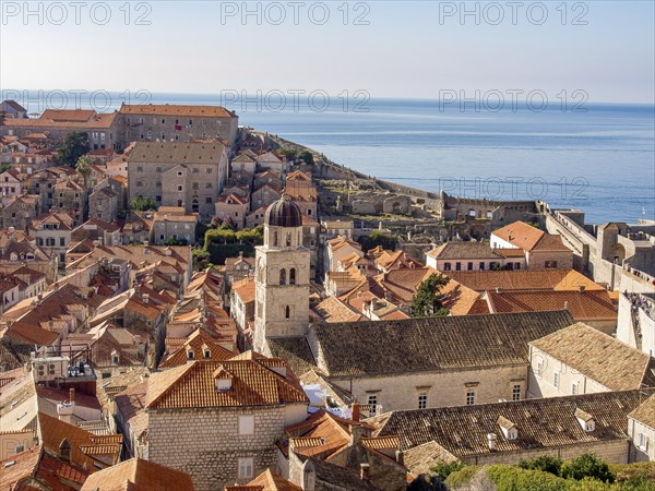 A historic city with red roofs and a church tower by the sea, Dubrovnik, Mediterranean, Croatia, Europe