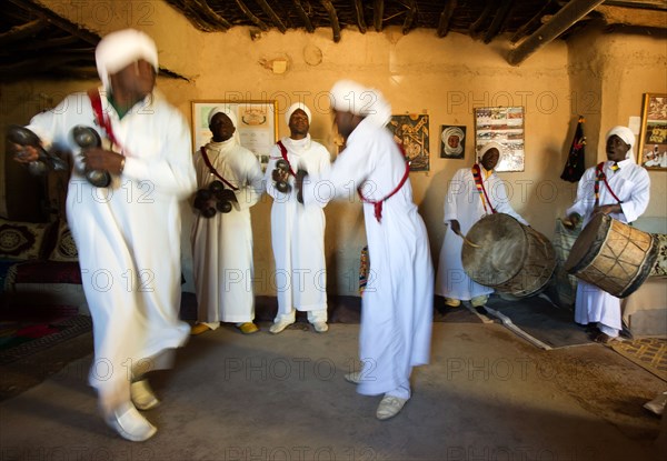 Morocco, traditional musicians with instruments, Pigeons du Sable group, Merzouga, Erg Chebbi desert, Africa