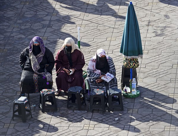 Morocco, Veiled Women, Hand Painting, Place Djemaa El Fna, Marrakech, Africa