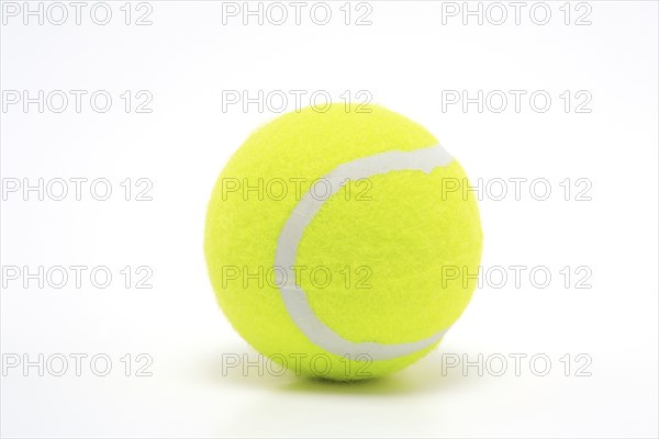 Sports equipment, single yellow tennis ball