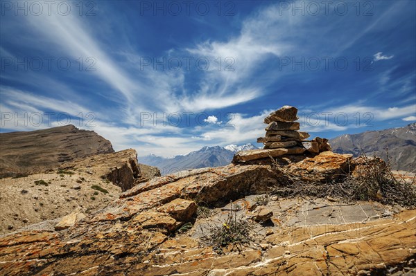 Stone cairn in Spiti Valley in Himalayas, Himachal Pradesh, India, Asia