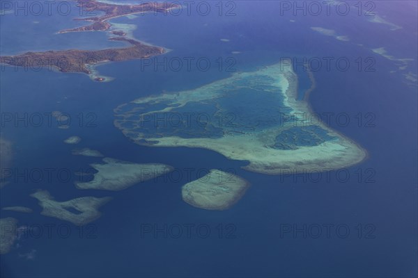 Aerial of little islets of the coast of Viti Levu, Fiji, South Pacific, Oceania