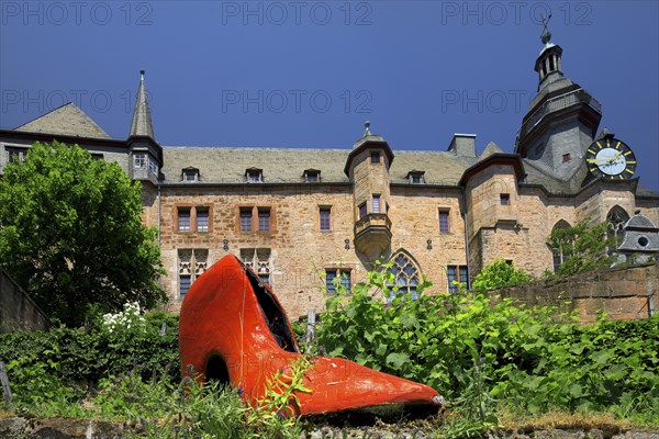 Cinderella's slipper in front of the Landgrave's castle, Grimm-Dich Trail, Brothers Grimm, Marburg an der Lahn, Hesse, Germany, Europe