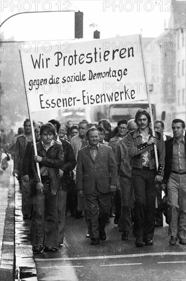 Workers of the Essen ironworks demonstrated against the reduction of social benefits after a works meeting in Essen, Germany, 24 September 1975, Europe