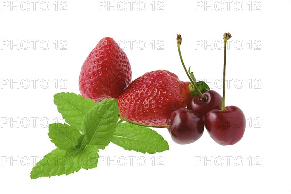 Fresh strawberry, cherry and mint isolated on white background