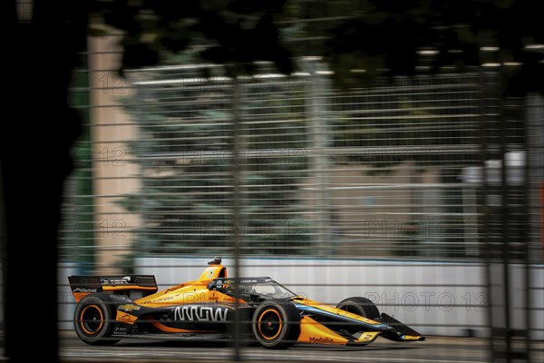 PATO OWARD (5) of Monterey, Mexico runs through the streets during the Honda Indy Toronto in Toronto, ON, CAN