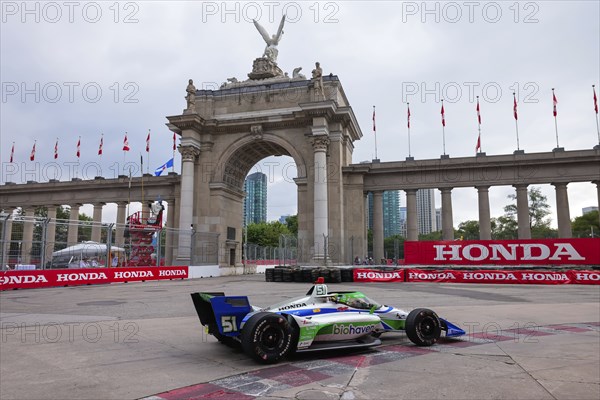 STING RAY ROBB (R) (51) of Payette, Idaho runs through the streets during the Honda Indy Toronto in Toronto, ON, CAN