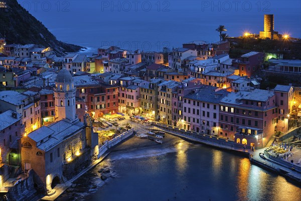 Vernazza village popular tourist destination in Cinque Terre National Park a UNESCO World Heritage Site, Liguria, Italy view illuminated in the night from Azure trail