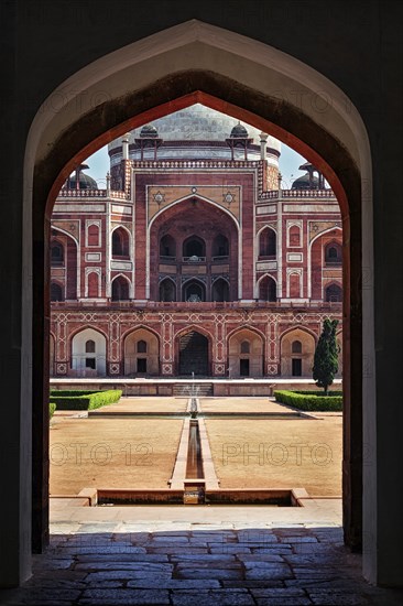 Delhi Indian tourist landmark Humayun's Tomb view through arch. Delhi, India, Asia