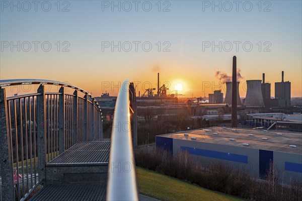 Landmark Angerpark Tiger & Turtle, Magic Mountain, walk-in sculpture in the form of a rollercoaster on the Heinrich-Hildebrand-Höhe spoil tip, HKM steelworks, sunset, Duisburg, North Rhine-Westphalia, Germany, Europe