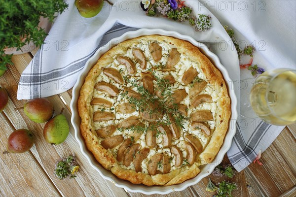 Tart with Gaishirtle and sheep's cheese, Stuttgarter Gaishirtle, pear variety, fruit, table decoration, thyme, baking, typical Swabian, Swabian cuisine, traditional cuisine reinterpreted, vegetarian, food photography, studio, Germany, Europe