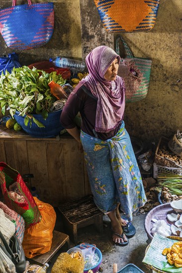 Traditional authentic food market, vendor, woman, fruit, vegetable, fresh, food, nutrition, sale, trade, bazaar, authentic, disease vector, food law, food control, stall, Asian, vegetable market, local, hygiene, virus, tradition, traditional, health, marketplace, market hall, tropical, travel, tourism, culture, poverty, presentation, cleanliness, person, Muslim, Islam, Lombok, Indonesia, Asia