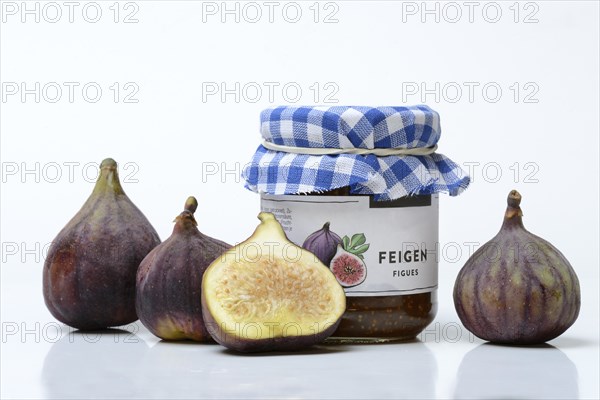 Fig jam in a jar and fresh figs, Ficus carica