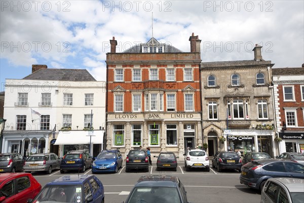 Lloyds Bank Limited building and shops in the Market Place, Devizes, Wiltshire, England, United Kingdom, Europe