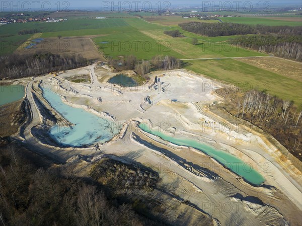 The Blue Hole, a residual hole from the kaolin mining operations of Kaolin- und Tonwerke Seilitz-Löthain GmbH, is now a natural paradise, but can only be entered by anglers, Ockrilla, Saxony, Germany, Europe