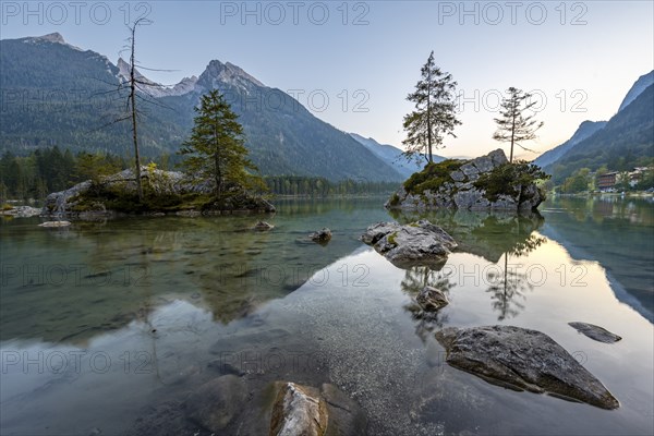 Hochkalter reflected in Hintersee, at sunset, Berchtesgaden National Park, Ramsau, Upper Bavaria, Bavaria, Germany, Europe