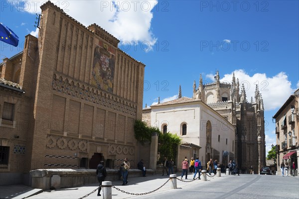 Pedestrian zone in Toledo with historic buildings and a Gothic church under a blue sky, art school, University of San Juan de los Reyes and Franciscan monastery, Toledo, Castilla-La Mancha, Spain, Europe