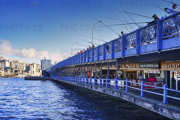 Fishermen on the Galata Bridge, Istanbul, Turkey, Asia