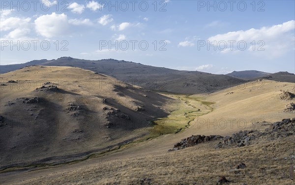 Small stream between mountainous hills, Song Kul, Naryn region, Kyrgyzstan, Asia