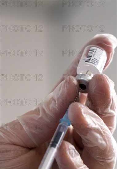 Start in the vaccination centre for corona vaccinations, in a hall of Messe Essen, for people over 80 years of age who do not live in nursing homes, preparation of the Pfizer-Biontech vaccine, drawing up into syringes, vaccination lines for a daily vaccination of up to 2400 people, operated by the Association of Statutory Health Insurance Physicians, Essen, North Rhine-Westphalia, Germany, Europe