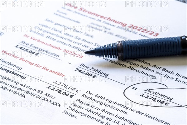 Symbolic image of electricity bill, billing of an electricity provider, additional payment due to increased energy costs and also consumption of electricity