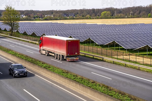 Solar park near Neukirchen-Vluyn, along the A40 motorway, over 10, 000 solar modules spread over 4.2 hectares, generating 6 million kilowatt hours per year, North Rhine-Westphalia, Germany, Europe