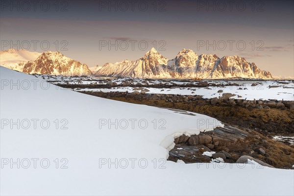 Winter landscape, Rugged mountains, Lofoten island Vestvågøya at the fjord Gimsøystraumen, Lofoten, Northern Norway, Norway, Europe