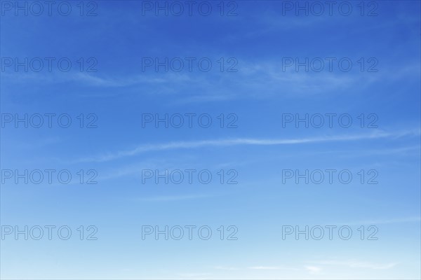 Peaceful and serene sky with white clouds background