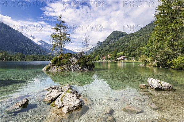 Hintersee near Ramsau with clear green water, surrounded by forests and mountains under a cloudy sky, Berchtesgaden National Park, Berchtesgadener Land, Upper Bavaria, Bavaria, Germany, Europe