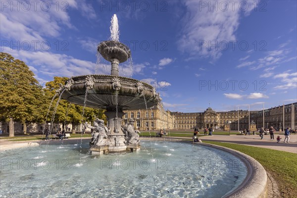 Palace square with New Palace. Fountain with fountain bowl. Place of interest in Stuttgart, Baden-Württemberg, Germany, Europe