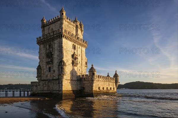 Belem Tower or Tower of St Vincent, famous tourist landmark of Lisboa and tourism attraction, on the bank of the Tagus River Tejo on sunset. Lisbon, Portugal, Europe