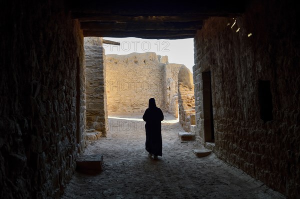 Local Veiled Woman in the Old City of AlUla, Medina Province, Saudi Arabia, Arabian Peninsula, Asia