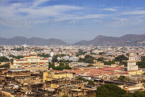 Aerial view of Jaipur (view from Isar Lat (Swargasuli) Tower) City Palace complex. On the left is Chandra Mahal with the flag of the royal family. Jaipur, Rajasthan, India, Asia