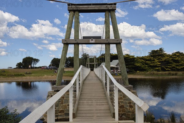 Spanning across the Erskine River, the Swing Bridge grants pedestrian access to the beach, Lorne, Victoria, Australia, Oceania