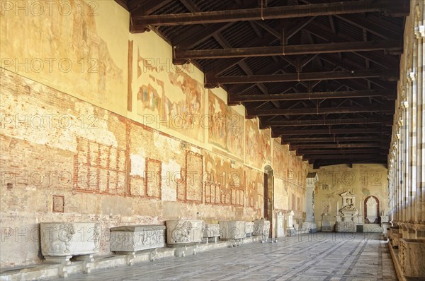 Frescoes and sarcophagi in the hallway of the Cemetery (Camposanto) on the Square of Miracles (Campo dei Miracoli) in Pisa, Tuscany, Italy, Europe