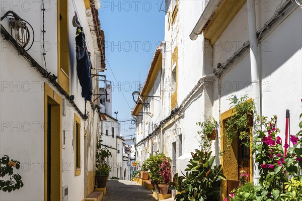 Scenic view of the old town of Elvas in Alentejo, Portugal. Narrow streets of whitewashed white houses