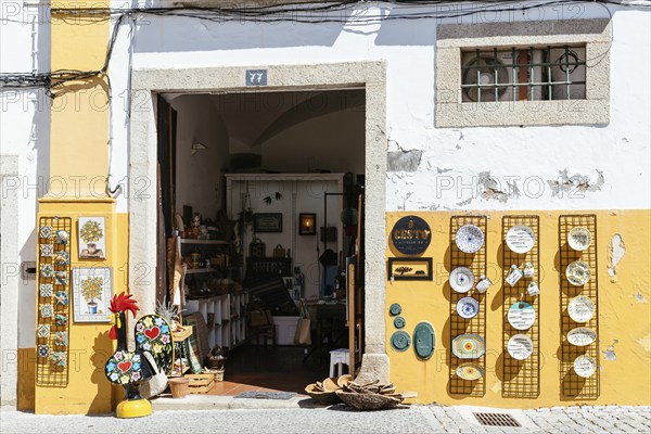 Evora, Portugal, June 30, 2022: Shop selling typical Alentejo artisan products in the old town of Evora, Europe