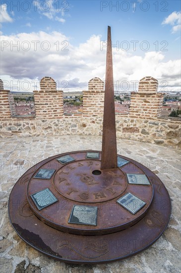 Avila, Spain, November 11, 2014: Metal Sundial in The Medieval Walls of Avila. The old city and its extramural churches were declared a World Heritage site by UNESCO, Europe