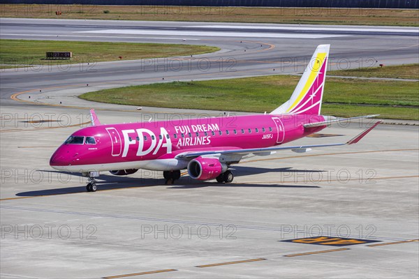 Fuji Dream Airlines FDA Embraer 175 aircraft with registration JA15FJ at Kobe Airport (UKB) in Kobe, Japan, Asia