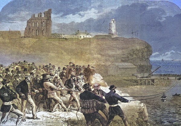 The Tynemouth Brigade of Volunteer Rescue Squads practising manoeuvring the rescue gondola, In the background the ruins of Tynemouth caslte, 1869, England, Historic, digitally restored reproduction of an original 19th century artwork, exact original date unknown